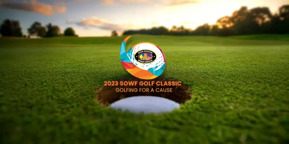 An image of an golf ball in a hole in one.