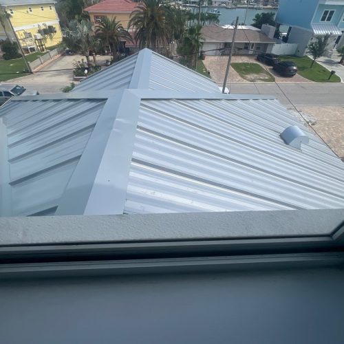 View of grey metal roof from inside residential home