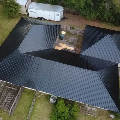 Aerial view of new black metal roof