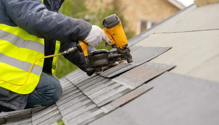 Roofer,Worker,In,Special,Protective,Work,Wear,And,Gloves,,Using